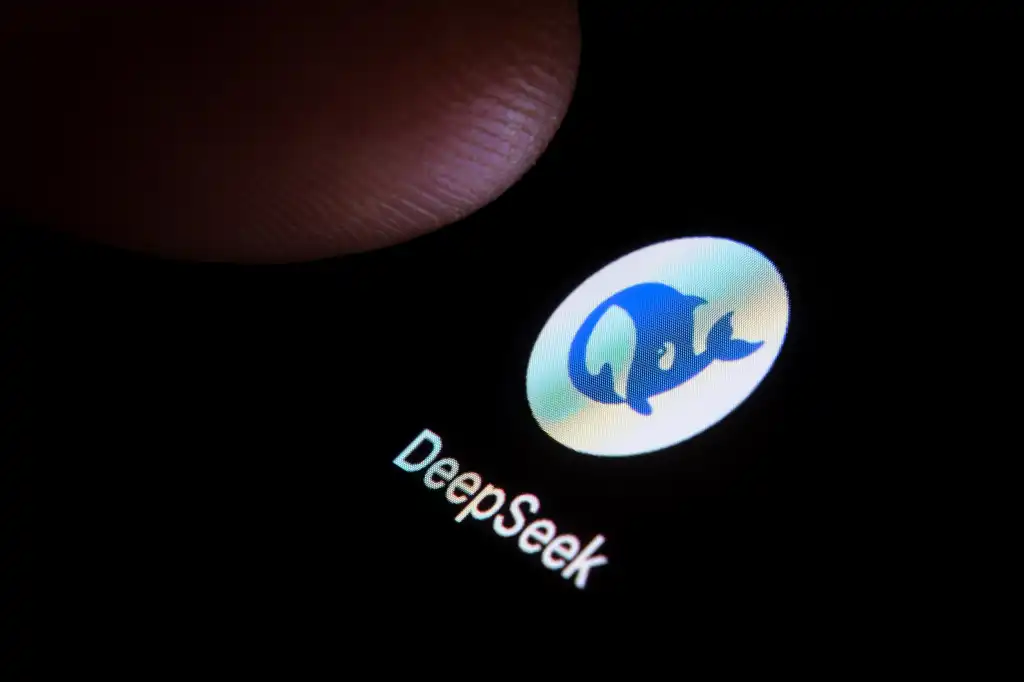 DeepSeek AI app seen on the smartphone and finger is about to touch it.