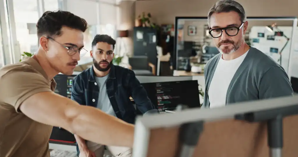 Programmer, planning and presentation with business people in office for website developer, coding bootcamp and review. Mentor, collaboration and software engineer with employees in tech startup