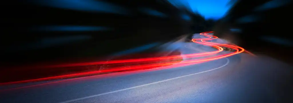 A red line on a curvy road: speed trail, go fast.