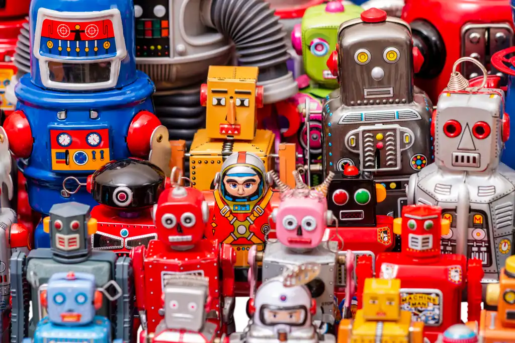 shutterstock 1735661867 colorful collection of vintage tin toy robots